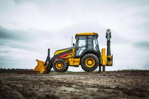 Bulldozer Park Sideways in a field — Excavator Services in Pink Lily, QLD
